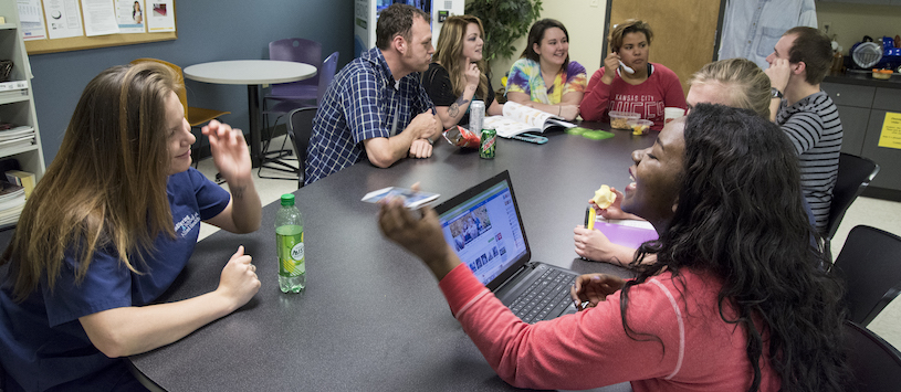 A group of students in the student lounge.