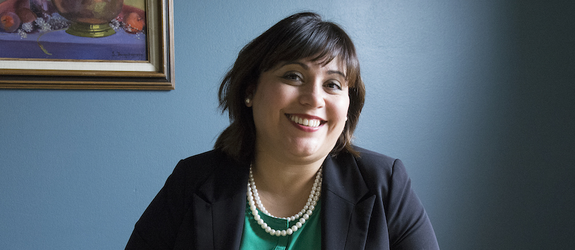 A smiling admissions advisor